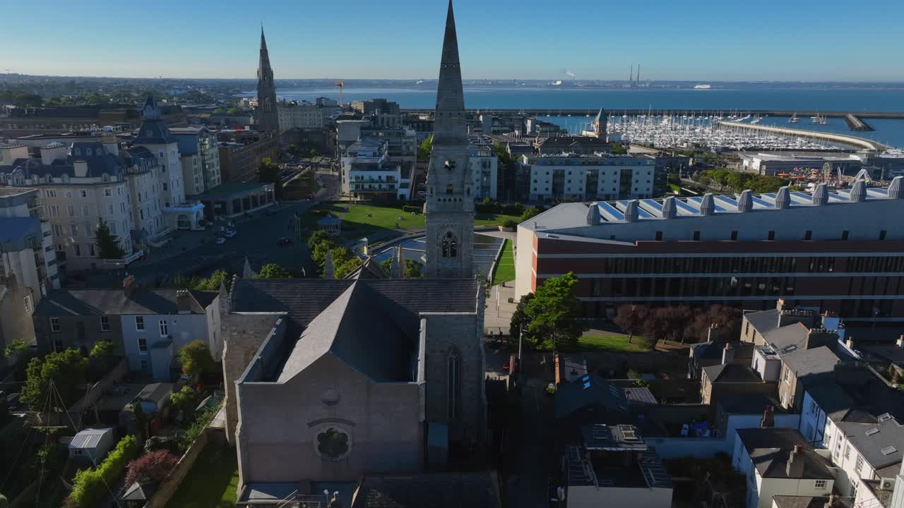 Maritime Museum, County Dublin, Dun Laoghaire, September 2024. Drone orbits clockwise and descends showcasing the Mariners' Church with views of the LexIcon library and the Harbour in the background.