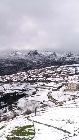 snow mountain village vertical video