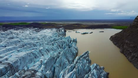 Fly-Over-Lagoon-With-Svinafellsjokull-Glacier-In-Vatnajökull,-Southern-Iceland