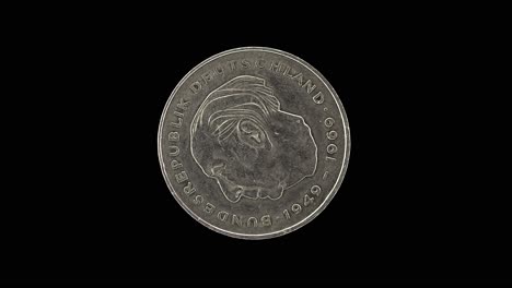 Germany 2 Deutsche Mark obverse with portrait of Theodor Heuss, macro loop on black background