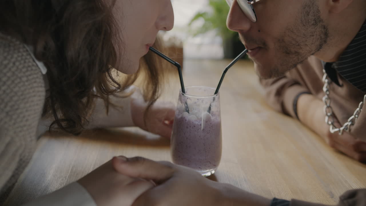 Couple Sharing a Smoothie