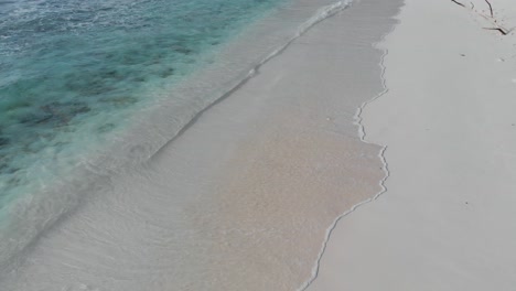 Aerial-view-of-the-white-beaches-and-turquoise-waters-at-Anse-Coco,-Petit-Anse-and-Grand-Anse-on-La-Digue,-an-island-of-the-Seychelles