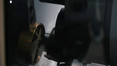 close-up view of a metalworking machine in action