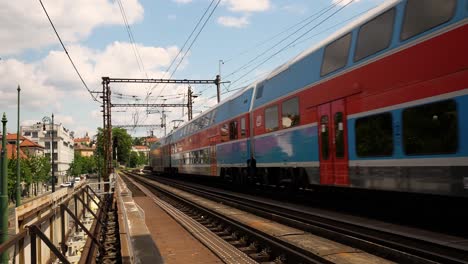 train passing through city streets