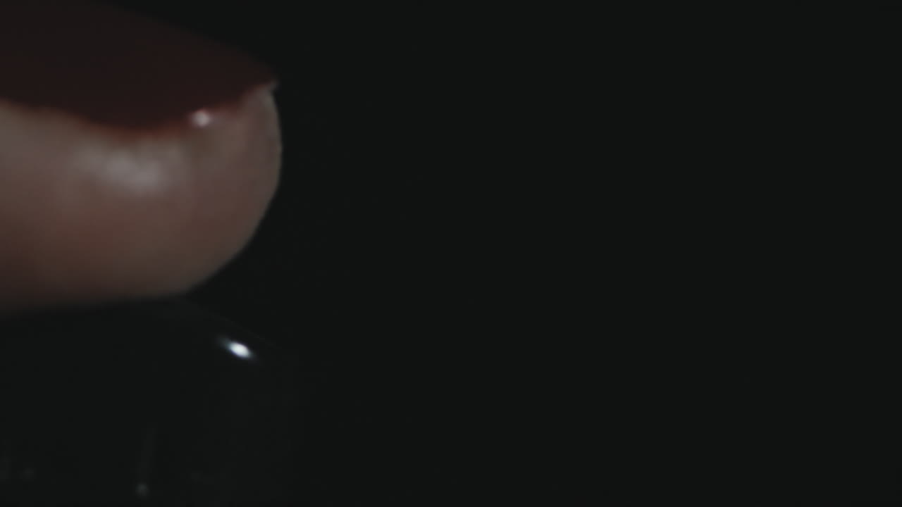 Close-up of a lighter in action