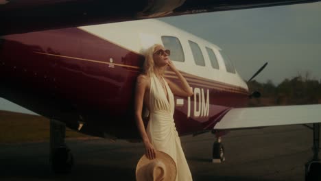 woman by private jet