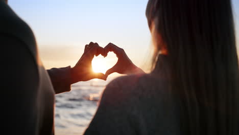 silhouette, couple and heart hands