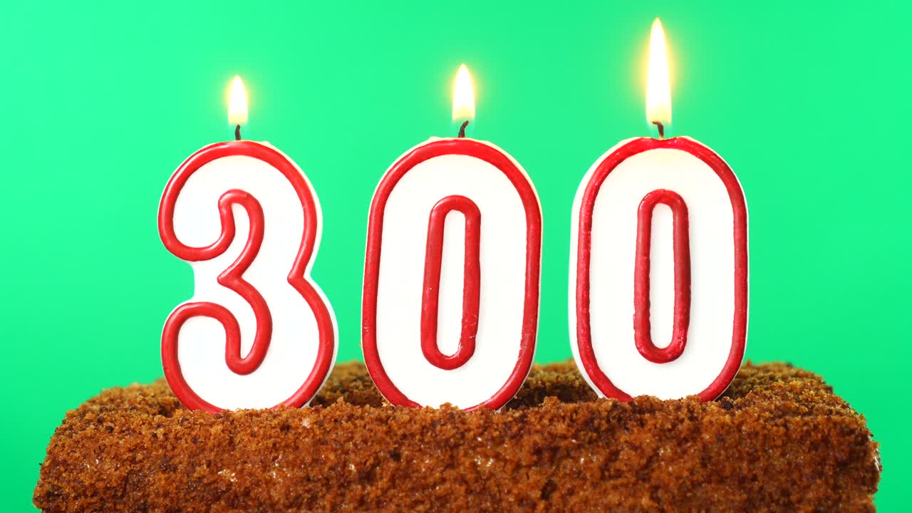 Cake with the number 300 lighted candle. Chroma key. Green Screen. Isolated