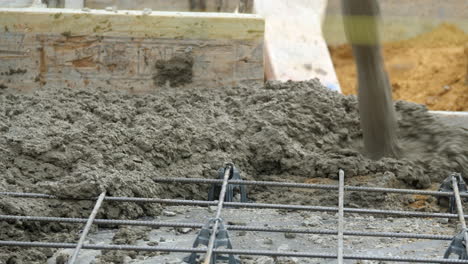 Wet Cement Splattering Over Wire Mesh For New Property Build Slab