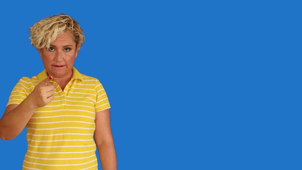 A deaf woman shows the sign language at chroma key background 2
