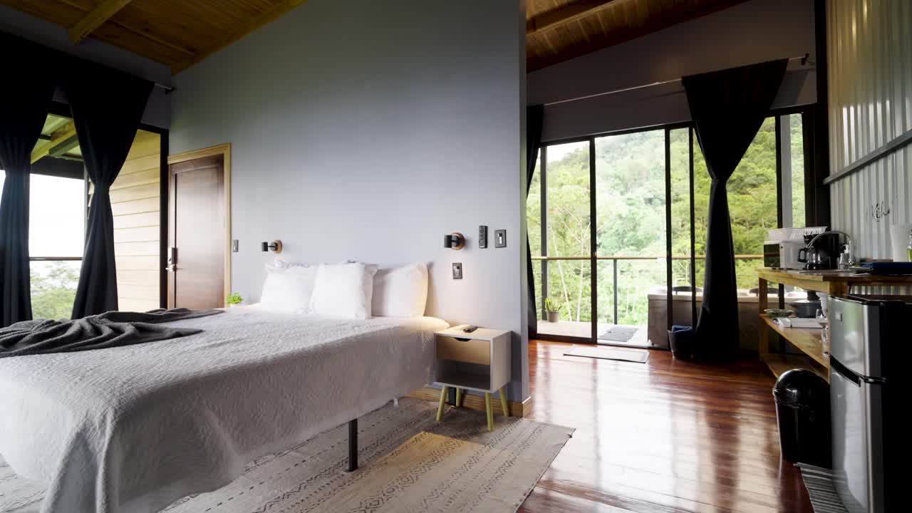 Bedroom with natural light and mountain view