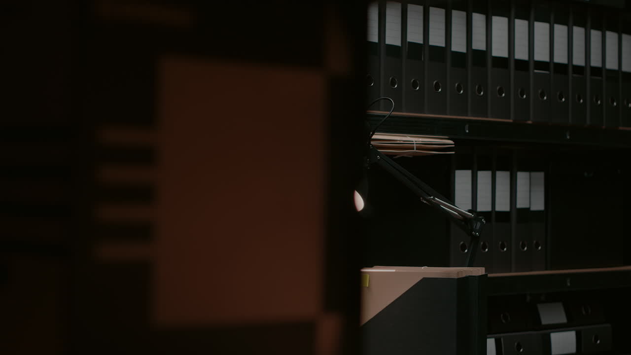 Office Workspace with Lamp and Folders