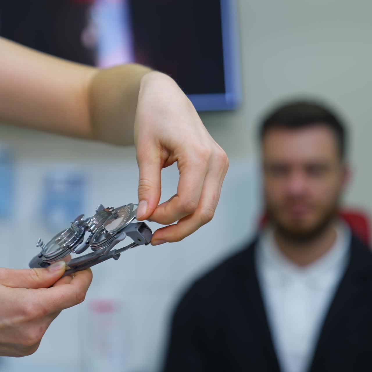 Doctor with trial frame in clinic