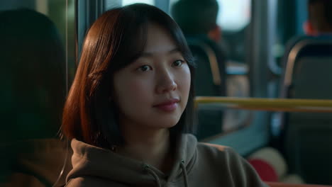 young woman on a bus