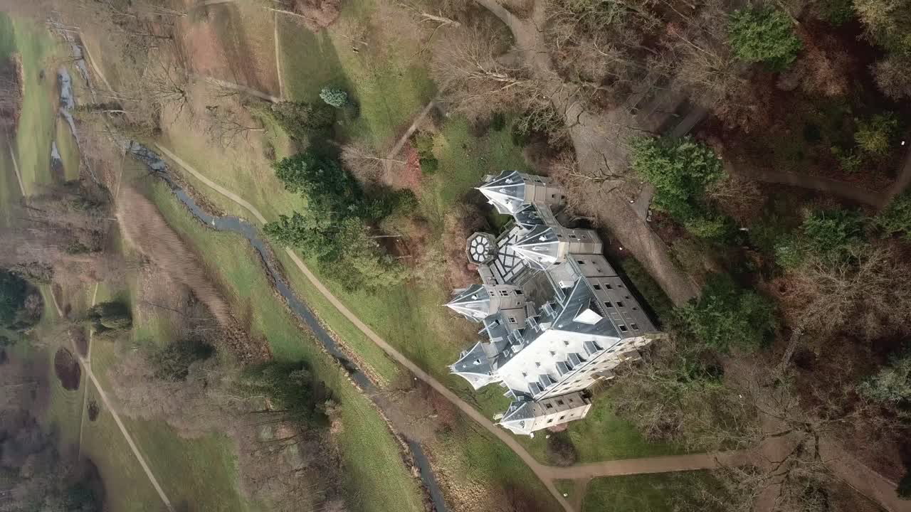 cinematic journey through Gołuch&oacute;w Castle and its park unfolds in this vertical drone footage