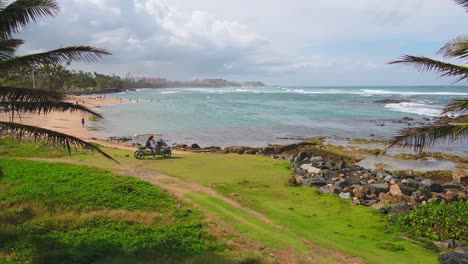 Droning-along-the-shores-of-Old-San-Juan,-Puerto-Rico-on-a-windy-day