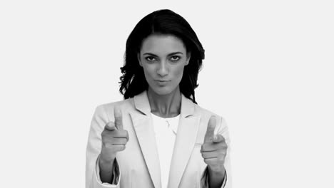 businesswoman snapping her fingers and pointing