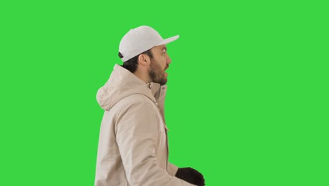 hip-hop man singing rap, walking and making gestures on a green screen, chroma key