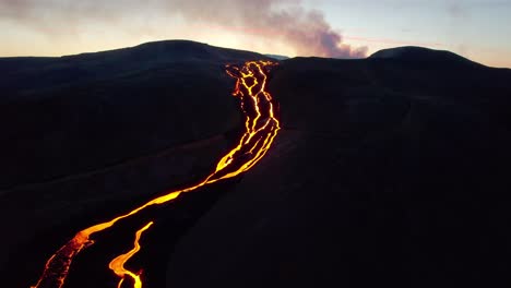 aerial flying up lava rivers iceland eruption revealing shot