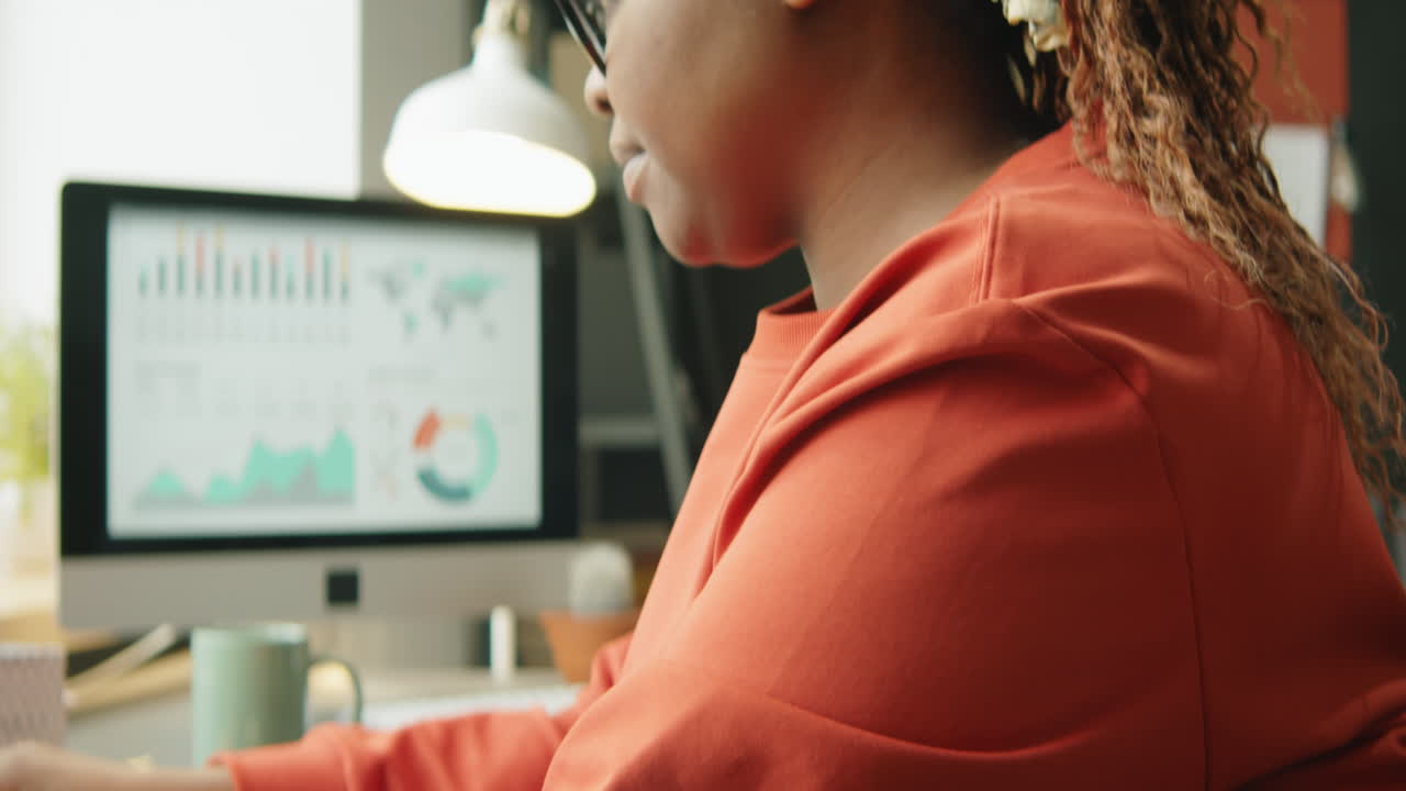 African American Woman Posing for Camera at Home Workplace