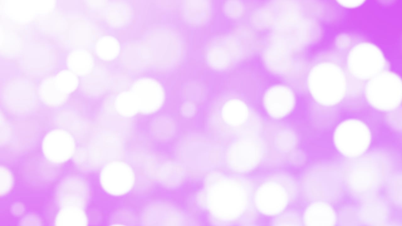 partículas púrpuras que se mueven alrededor