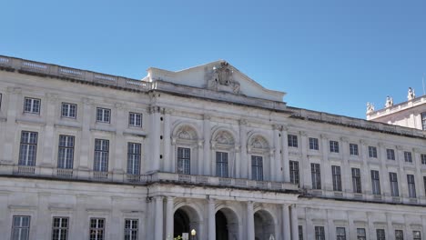 grand architecture of the ajuda palace in lisbon on a sunny day. pan right shot