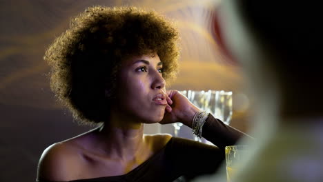 woman talking in the pub