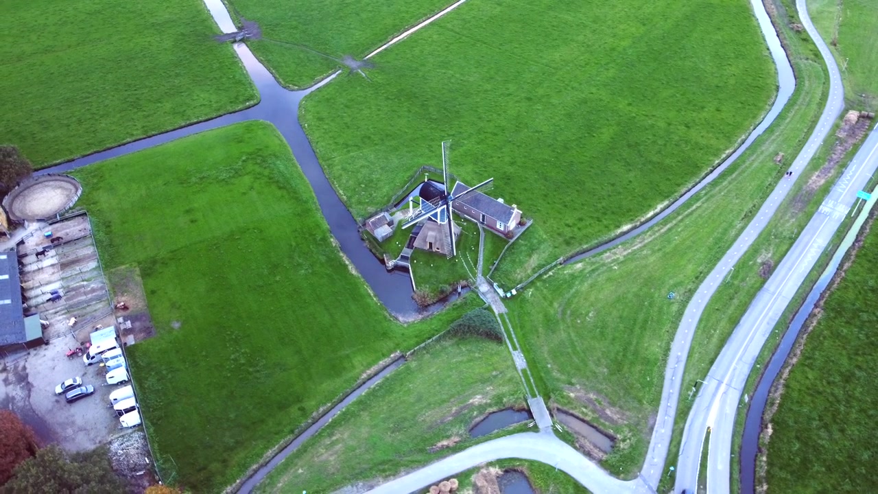 Old and proud, yet working still, timeless charm of a Dutch windmill