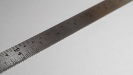 trimming paper with a razor knife on the cutting mat