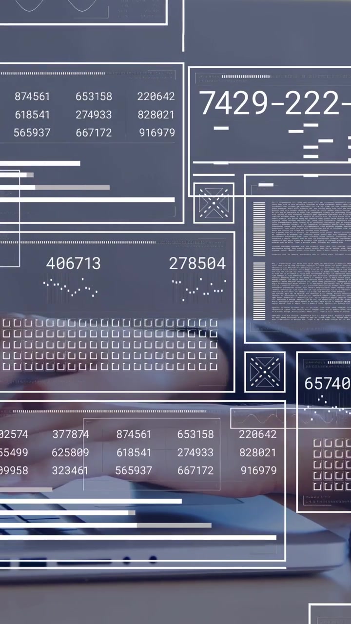 Vertical video: Analyst touching laptop, activating HUD panels over keyboard for business analysis