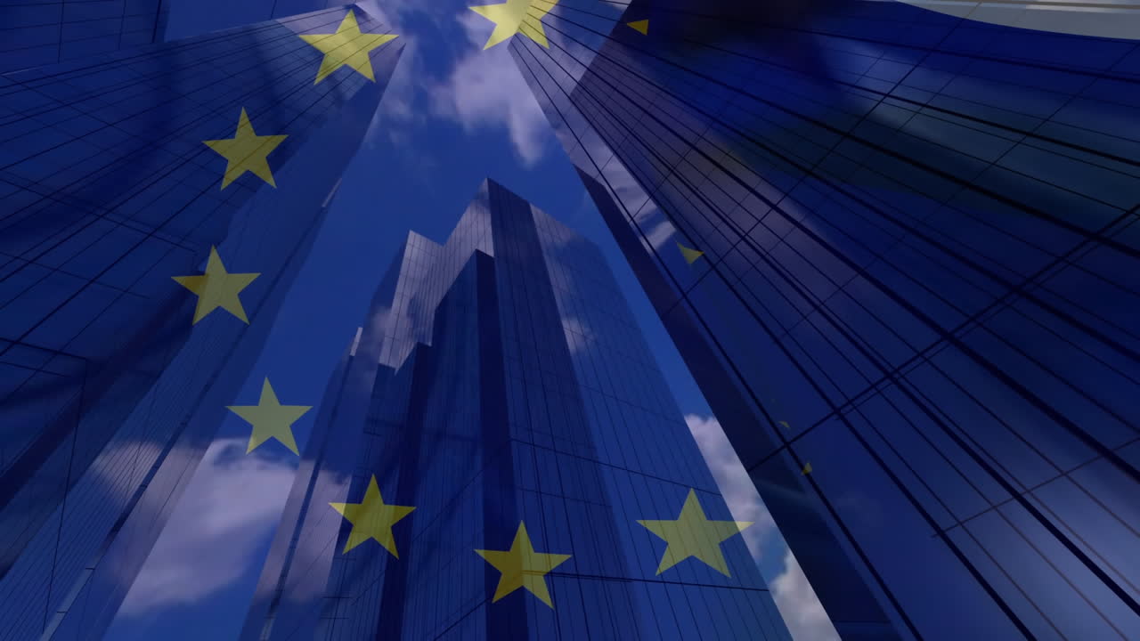 Bandiera UE con moderni edifici per uffici sullo sfondo