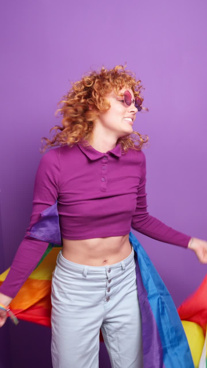 Young woman with pride flag