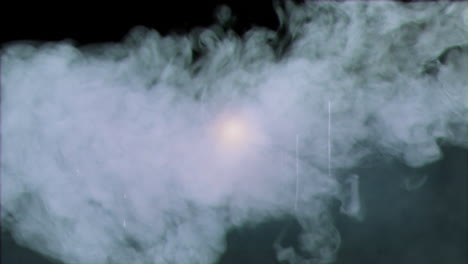 animación de manchas de luz brillante en movimiento y nubes de humo sobre fondo negro