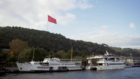 big flag of turkey on the hill in istanbul