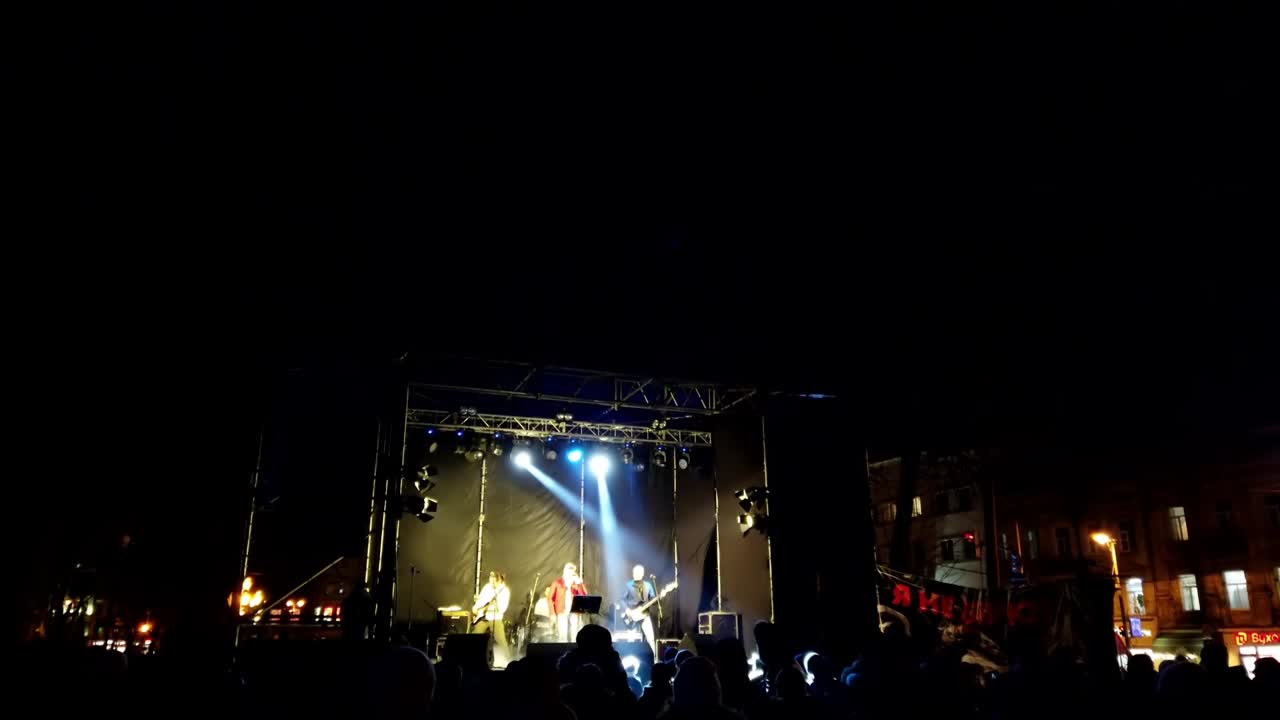 Filmagem do concerto no palco.