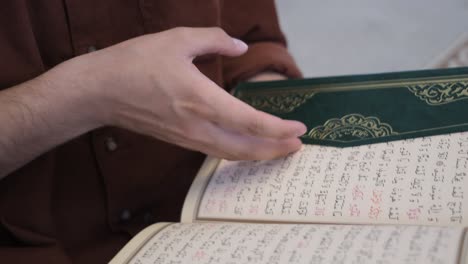 Opening quran close-up