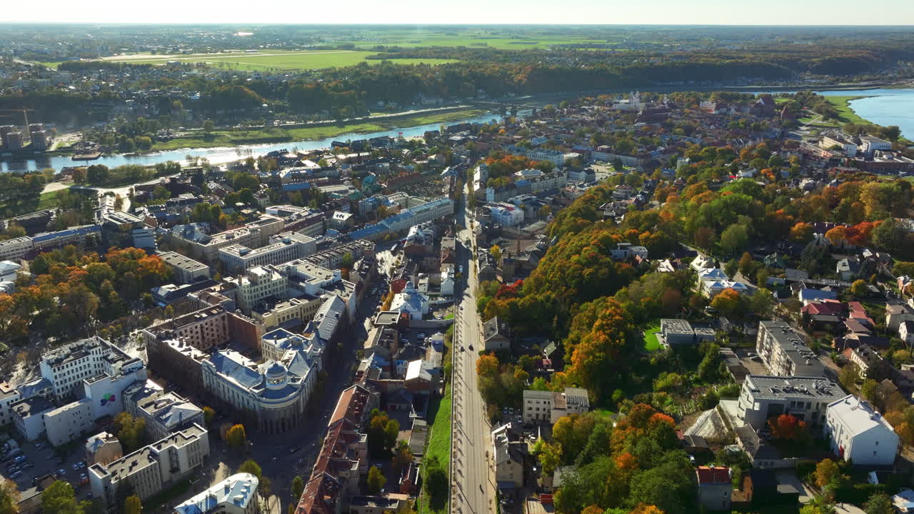 Drone footage of Kaunas city center located in Lithuania, Baltic states, Europe. Old Town, river Nemunas, and general city traffic are visible. High quality 4k prores footage.