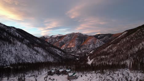 Sunset-on-a-snow-covered-mountain-during-golden-hour