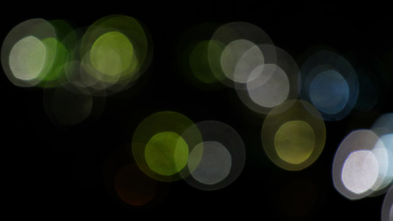 블랙에 빛의 서클의 보케 비디오 배경 렌즈 빛 누출 효과