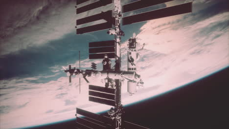 International-space-station-on-orbit-of-Earth-planet-view-from-outer-space