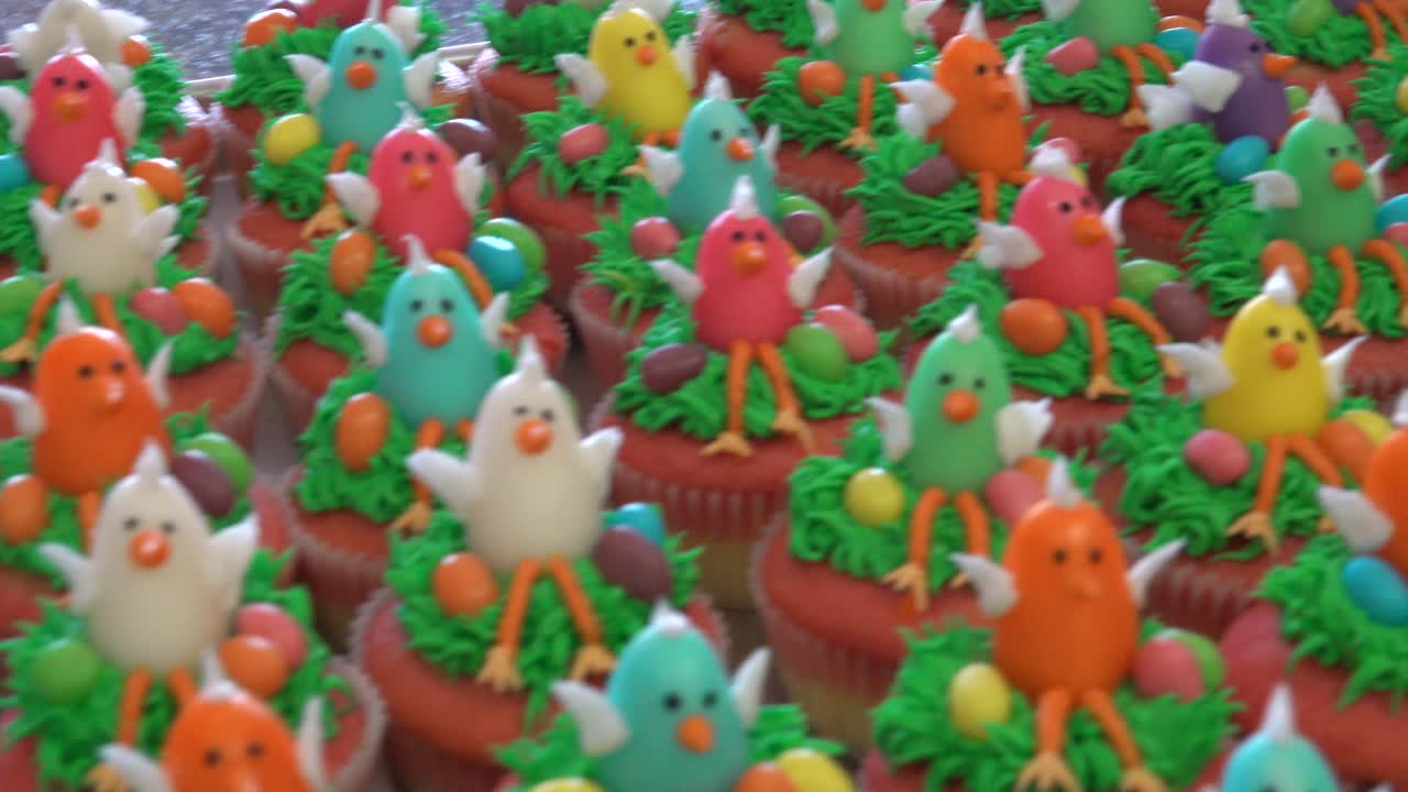Assortment of Festive Easter Cupcakes with Chick and Bunny Decorations