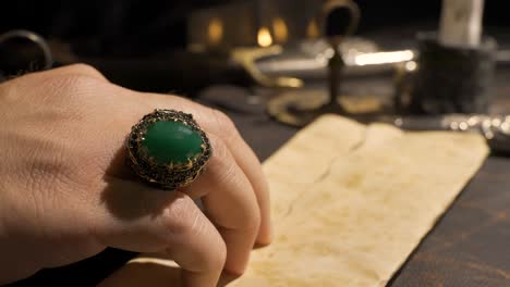 Green-embroidered-ring-detail.-Historical-background.