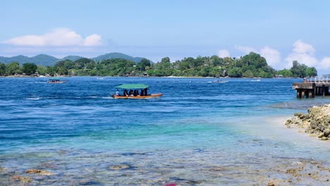 Boats-Crossing-Buka-Passage-in-Bougainville,-Papua-New-Guinea