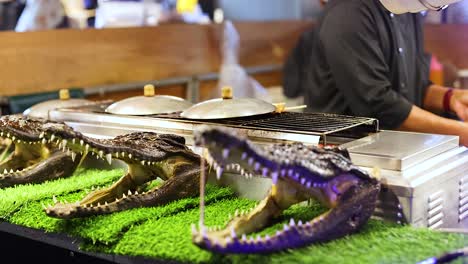 grilled crocodile meat served at bustling night market