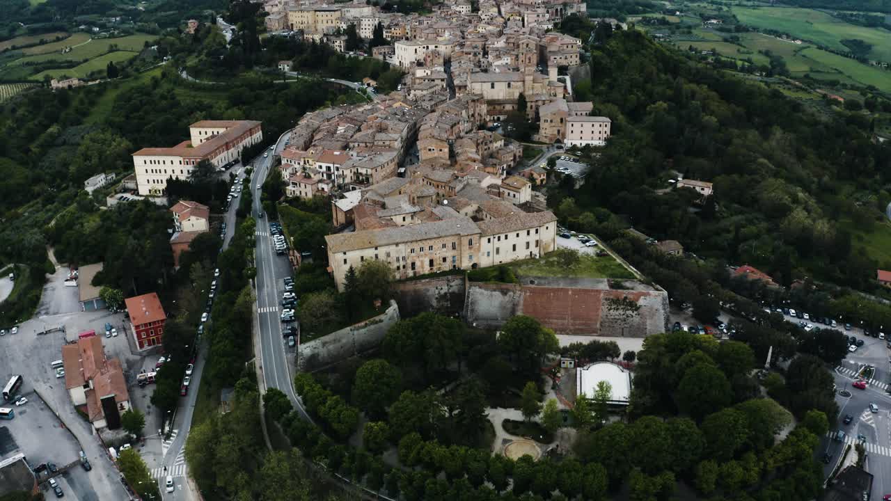 Aerial view tilting up to reveal Montepulciano, Tuscany in Italy's more isolated countryside