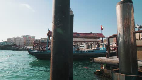 traditional abras, wooden boats parked at dubai creek