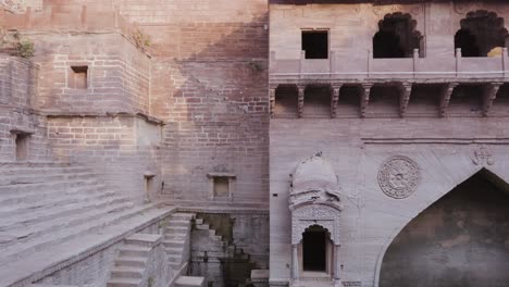 ancient red stone unique stepwell architecture at day from different angle angle video is taken at toorji ka jhalra or stepwell jodhpur rajasthan india