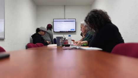 group of women engaged in a collaborative work session