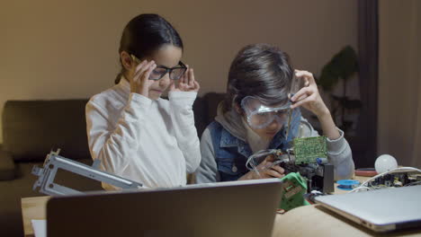 two schoolchildren doing interesting project together