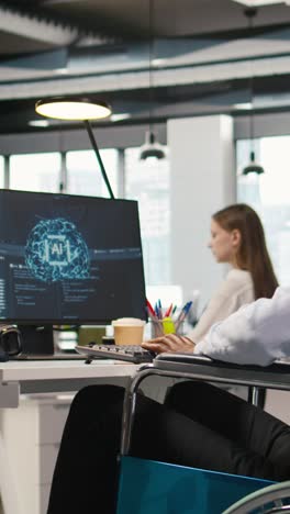 vertical video computer scientist with paraplegia in office automating repetitive tasks with ai